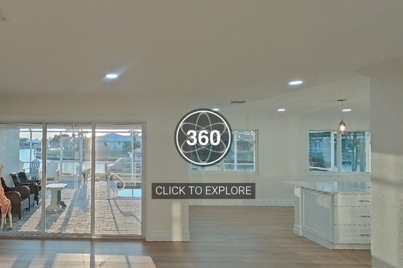 Inside a finished home in Punta Gorda, looking through sliding doors to the canal